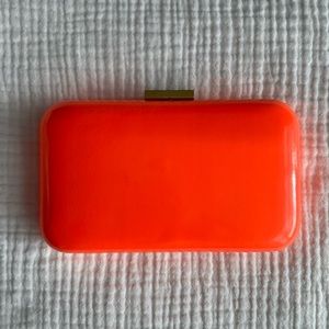 JCrew fluorescent orange clutch